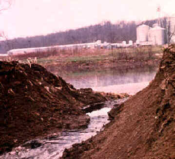 image #2 - lagoon berm failure